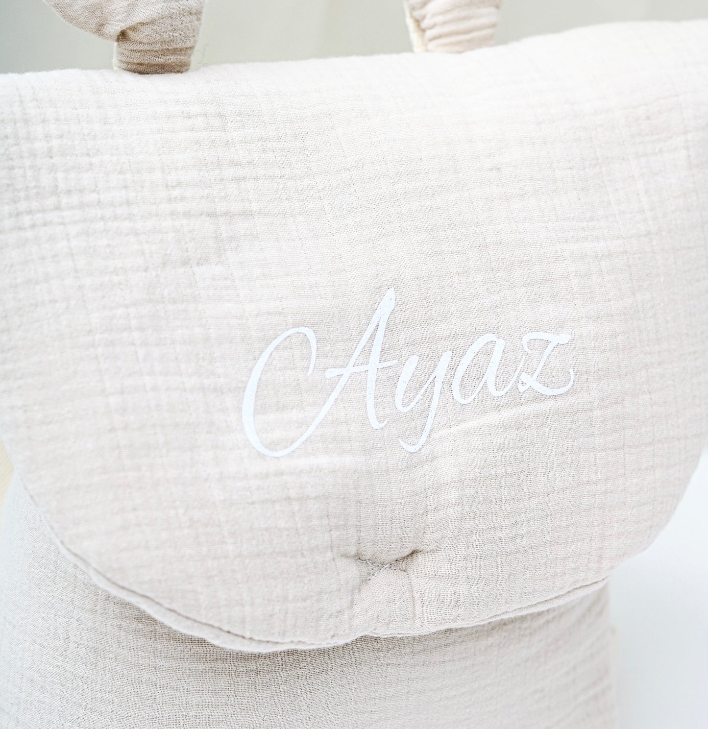 Zaino in cotone beige con coniglio a gas
