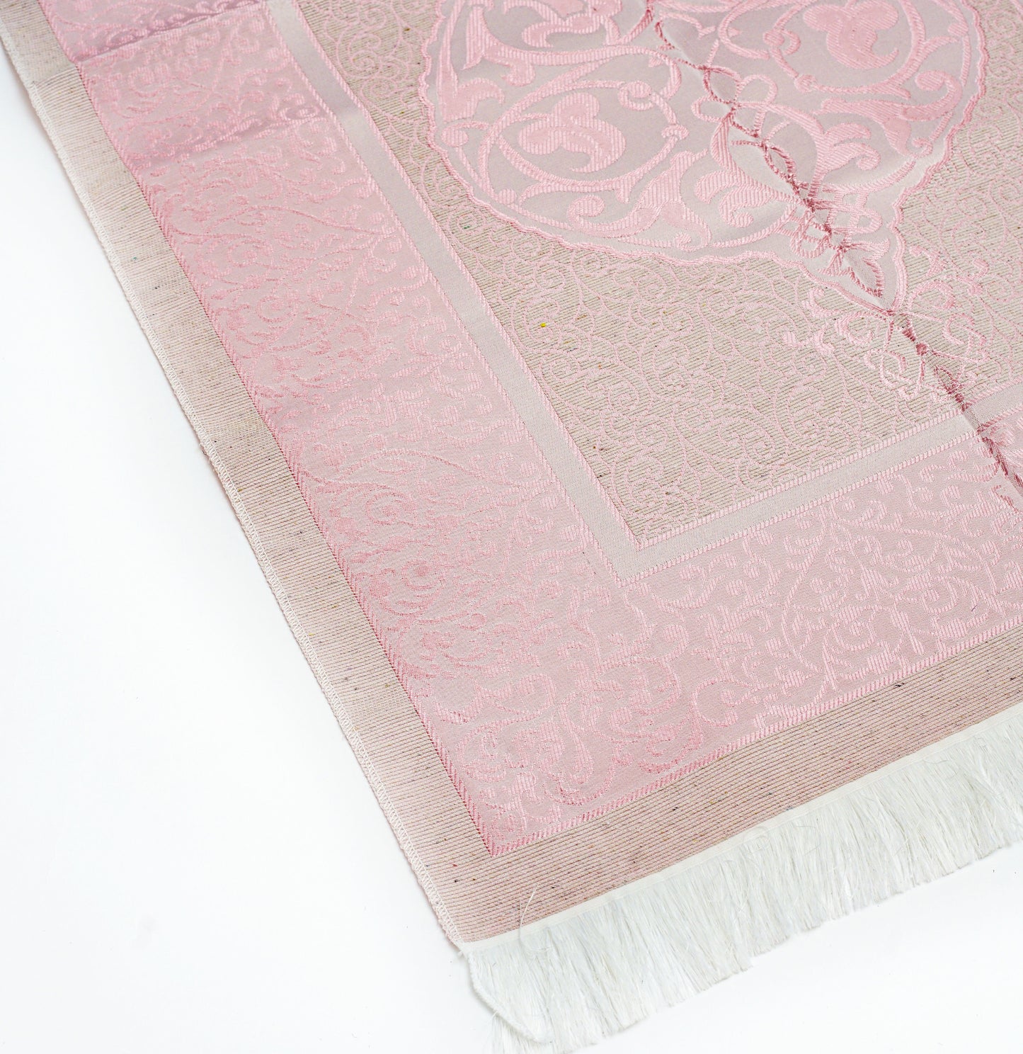 Tapis de prière fin rose.