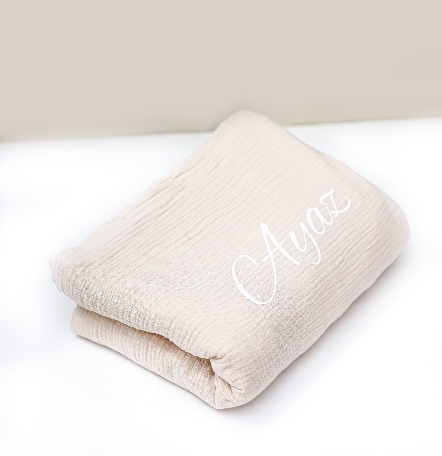 Beige Babydecke aus Baumwolle