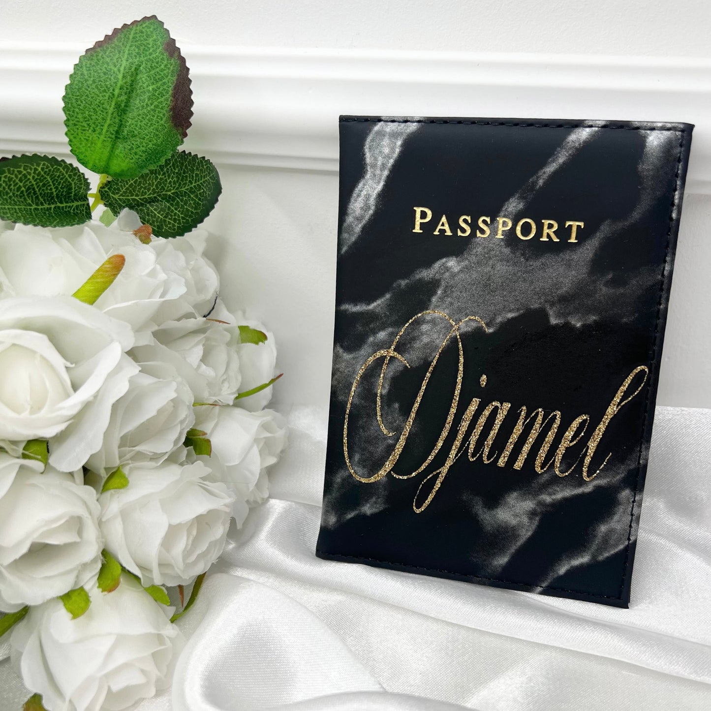 Porta pasaporte de mármol negro