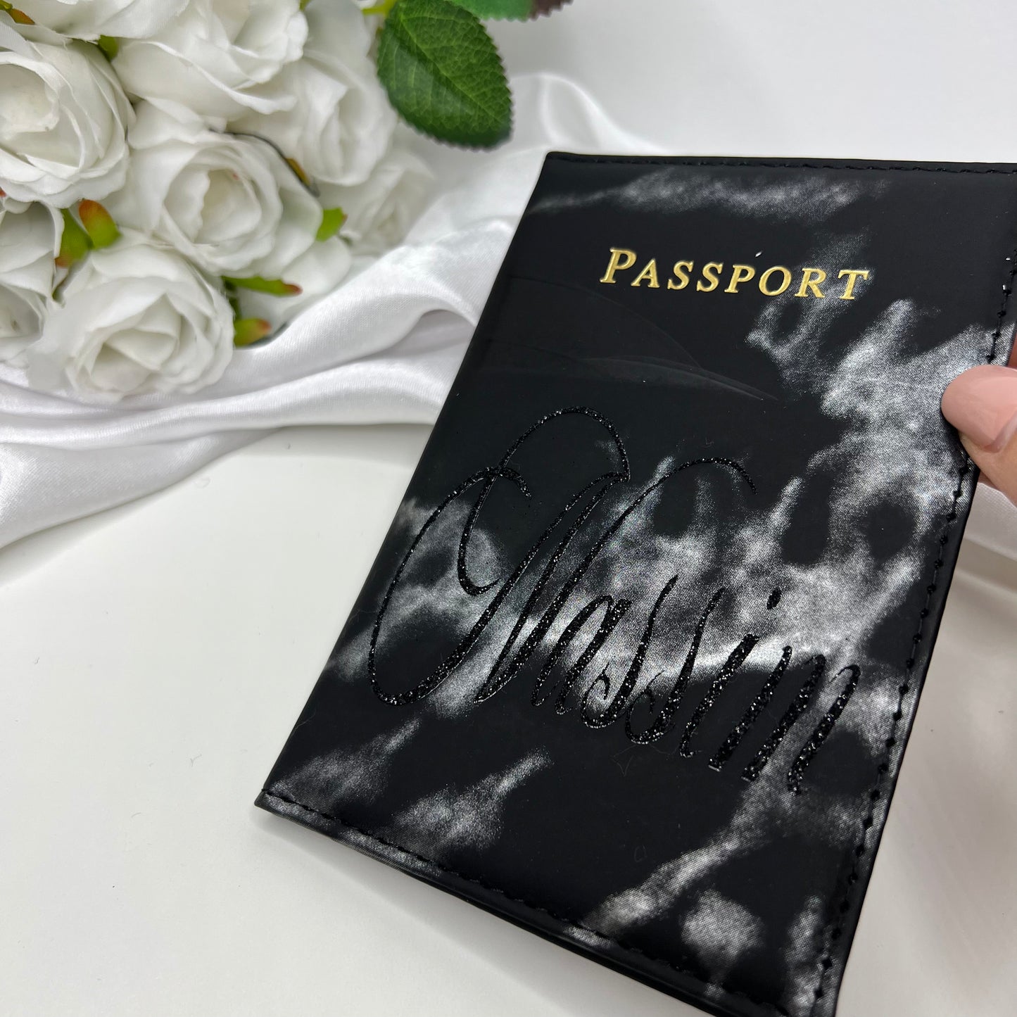 Porta pasaporte de mármol negro